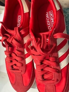 Red Adidas tennis shoe